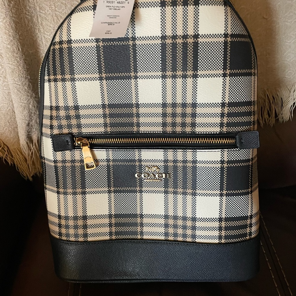 NWT. Coach navy blue and tan plaid backpack